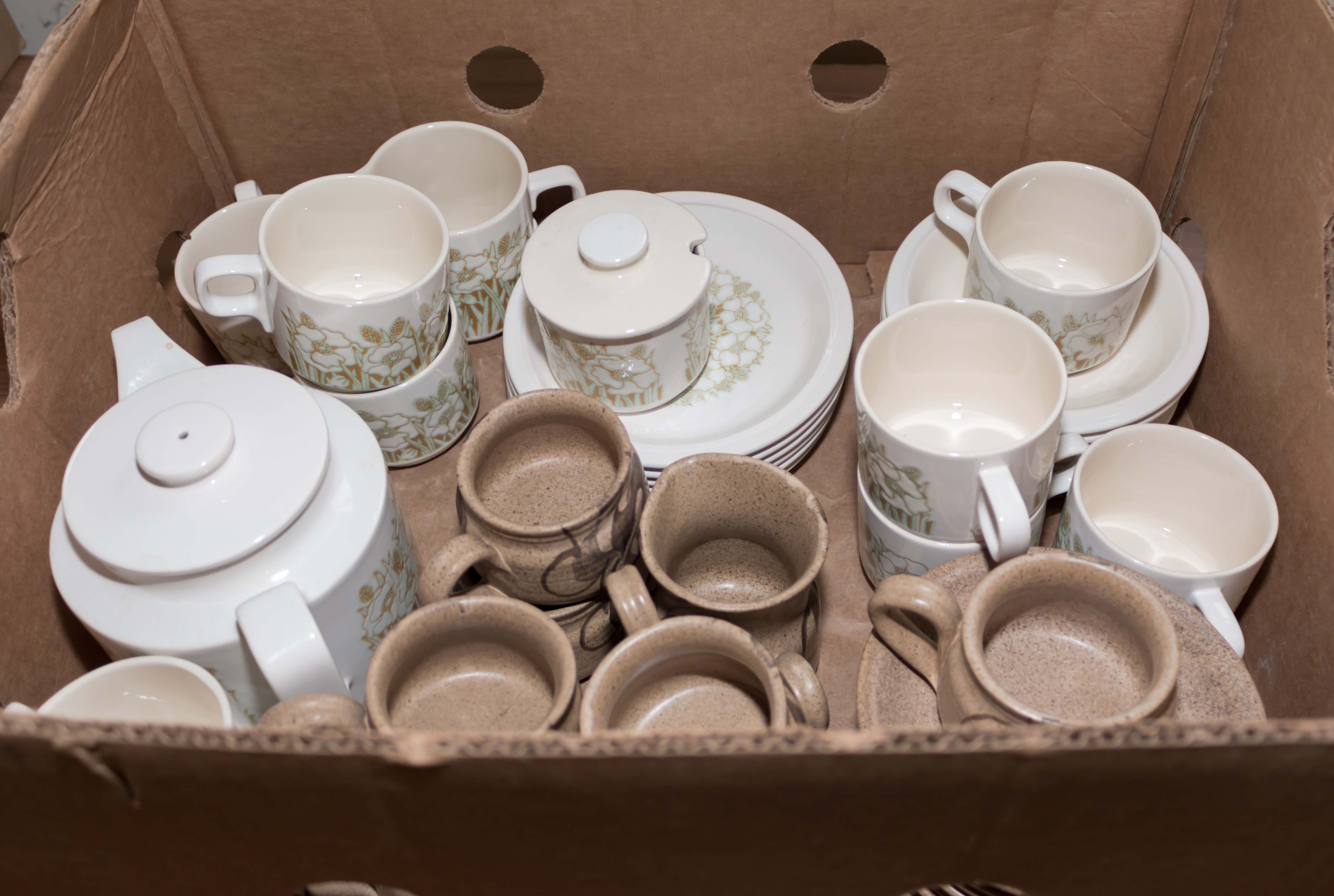 A box containing Hornsea pottery tea ware