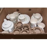 A box containing Hornsea pottery tea ware