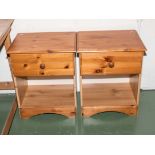A pair of pine bedside tables
