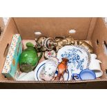 A box containing pottery items