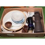 A box containing pottery items