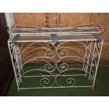 Two wrought iron radiator covers