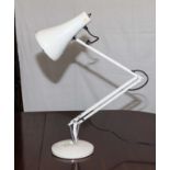 An angle poise lamp