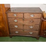 A chest of drawers in need of restoration