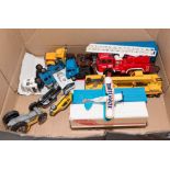 A box containing die cast model vehicles