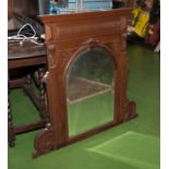 An over mantle mirror