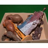 A box containing wooden animals and others