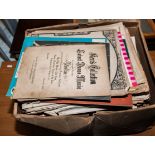 A box of vintage sheet music