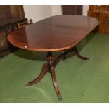 A Regency style mahogany dining table
