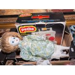 A child's sewing machine, doll and other items