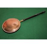 A copper warming pan