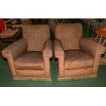 A pair of upholstered armchairs