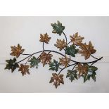 A metal leaf wall decoration