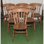 A set of six pine kitchen chairs