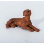 Hand-carved hardwood netsuke of a dog