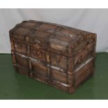 A domed top wooden trunk