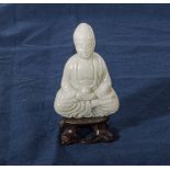 Small hardstone Buddha with hand-carved