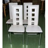 A set of four Art Deco style dining chairs