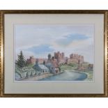 A framed watercolour depicting Bamburgh Castle signed Walter Wolfe 1990