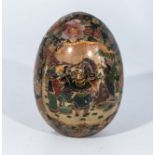 A Chinese hand decorated egg