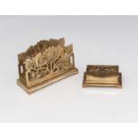 A brass letter stand and a brass stamp box