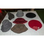 Seven vintage hats