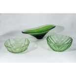 Three green art glass bowls