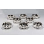 Eight silver plated fluted bowls