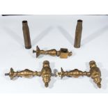 Two brass shells and three brass sconces