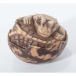 Tagua nut style netsuke of crocodile hatching from egg