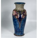 A large Royal Doulton stoneware vase with floral decoration, 38cm tall