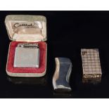 Three vintage cigarette lighters