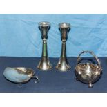 A pair of candlesticks and two others