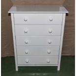 A five drawer white chest