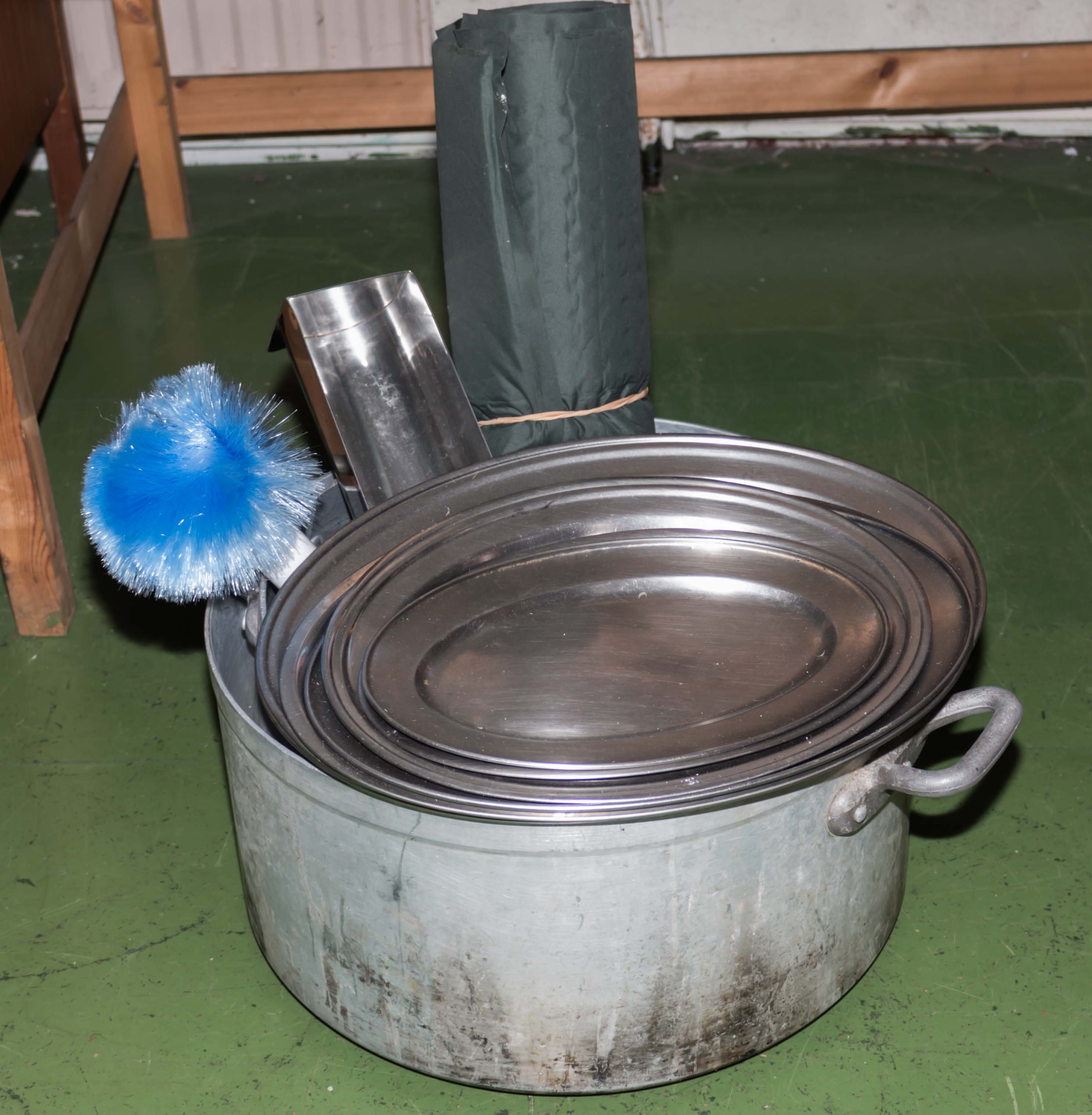 A large saucepan and serving trays