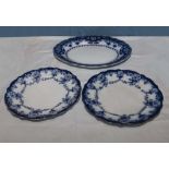 Three blue and white plates