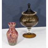 A marbled glass vase together with a lidded glass bowl