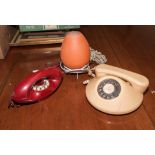 Two vintage telephones and a lamp