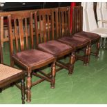 A set of four dining chairs