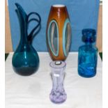 An art glass vase and three others