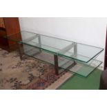 A two tier glass coffee table