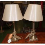 A pair of table lamps