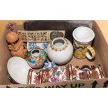 A box containing pottery items