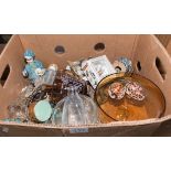 A box containing pottery and glass