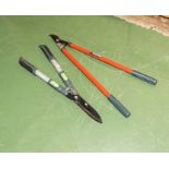 A pruning lopper and garden shears