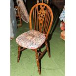 A spindle back kitchen chair