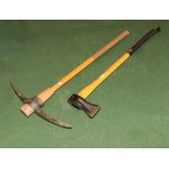 A pick axe together with an axe