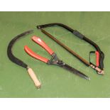 A sickle, bow saw and garden shears