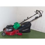 Mountfield 46R PD petrol driven lawn mower together with a fuel can