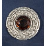 A large Celtic brooch set with an agate